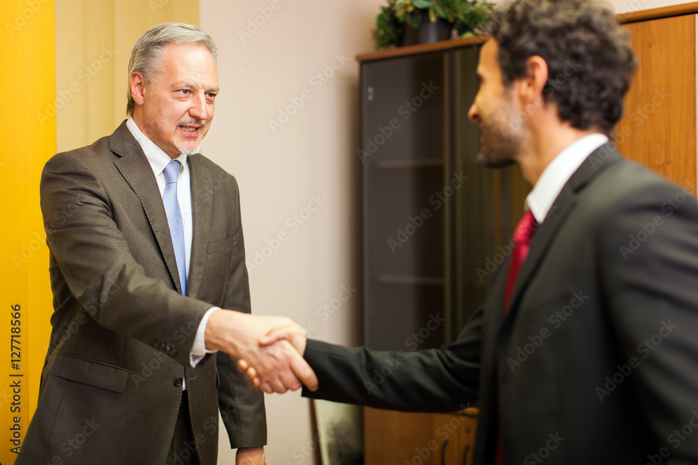 © Minerva Studio - Handshake between businessmen © Minerva Studio - Handshake between businessmen