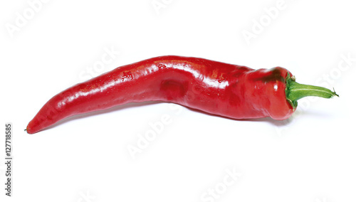 Pod fiery scalding red pepper isolated