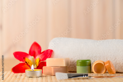 cosmetics for spa in a romantic setting with candles