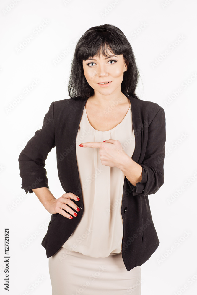 young woman pointing at white background. human emotion young woman pointing at white background. human emotion