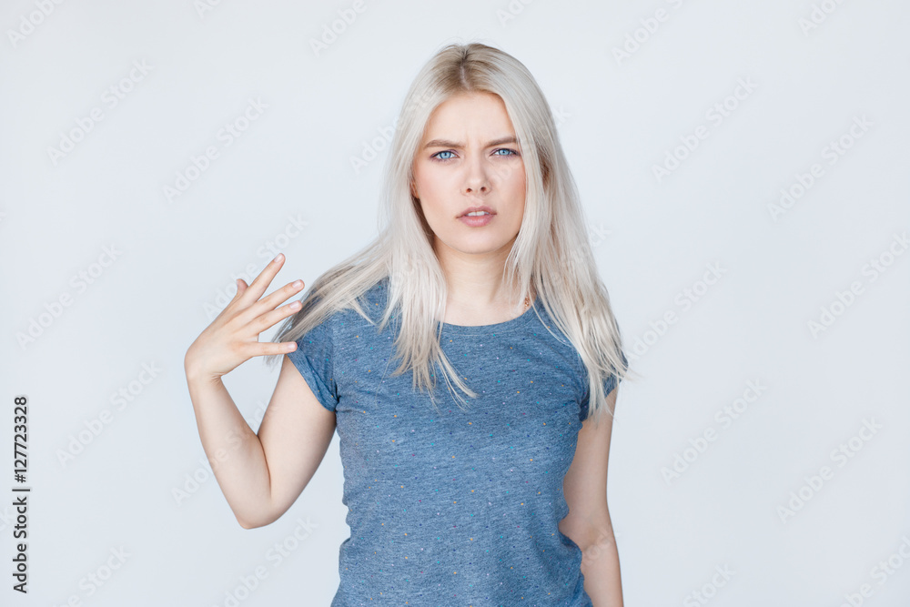 sexy blonde young woman showing rude gesture sexy blonde young woman showing rude gesture