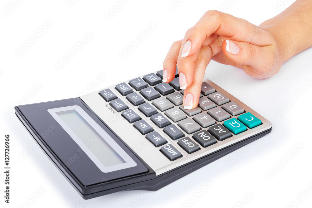 a calculator in a hand is isolated on a white background a calculator in a hand is isolated on a white background