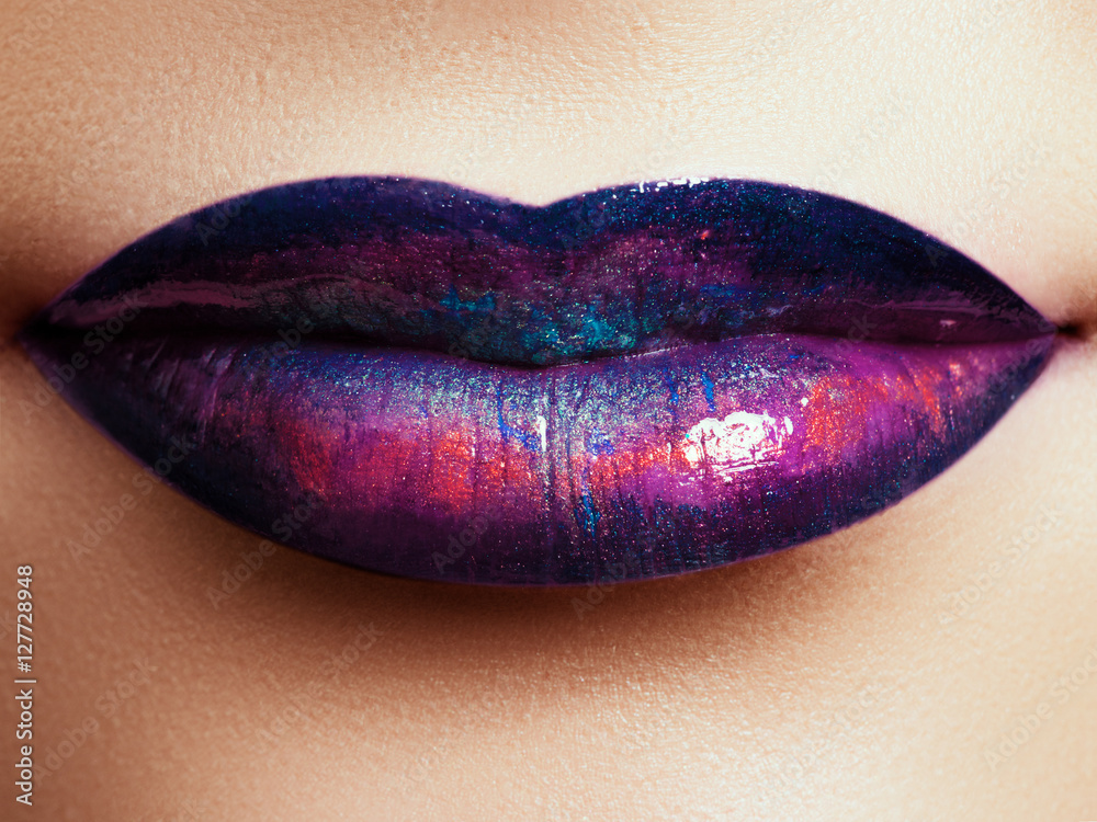 Closeup of beautiful full woman's lips with bright fashion gloss makeup Closeup of beautiful full woman's lips with bright fashion gloss makeup