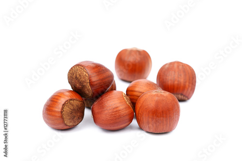 Group hazelnuts isolated on white background