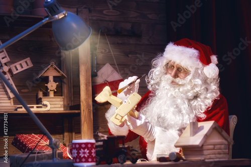 Santa Claus is preparing gifts