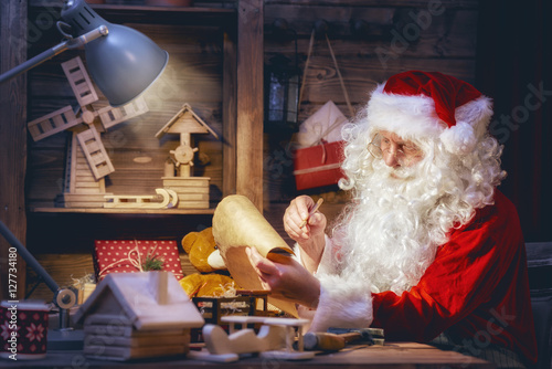 Santa Claus is preparing gifts