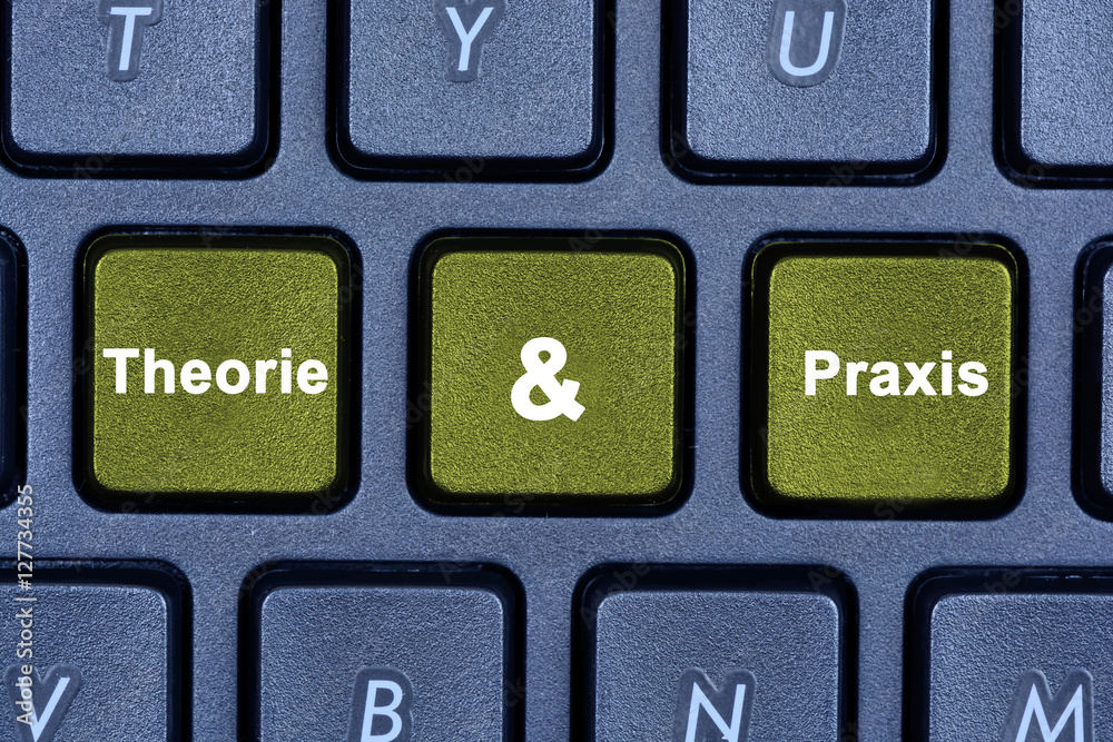 Theorie & Praxis words on keyboard button Theorie & Praxis words on keyboard button