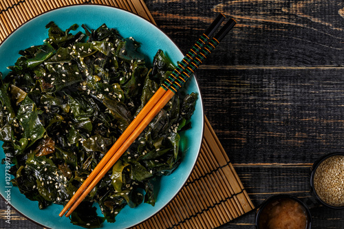 Wakame salad, raw seaweed, Japanese cuisine. photo