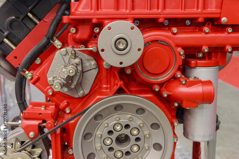 Fototapeta premium New red internal combustion engine close-up. Industry