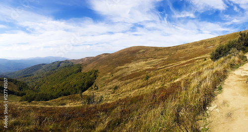 Hiking autumn trail in Bieszczady mountain. Rocks stones grass in The Bieszczady National Park. Carpathians, Poland.