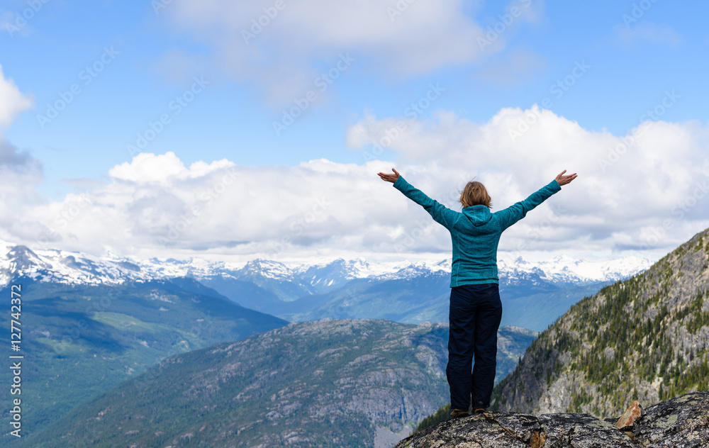 Active traveler hiking, enjoying the view, looking at mountains landscape. Mountaineering sport lifestyle concept. Canada Active traveler hiking, enjoying the view, looking at mountains landscape. Mountaineering sport lifestyle concept. Canada