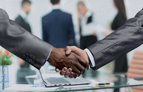 handshake of business partners.a successful and profitable agree photo