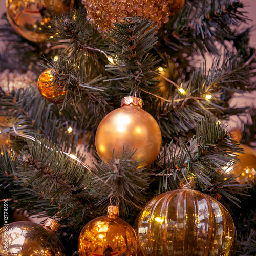 Christmas decorations on the branches of fir tree