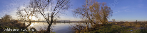 Beautiful panorama by the river in winter