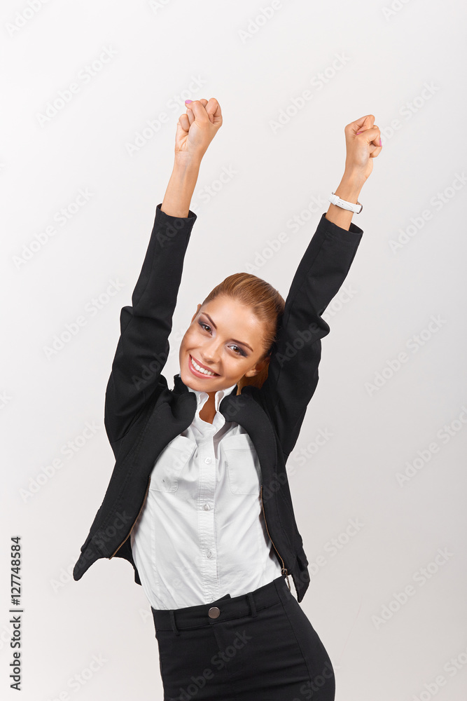 Successful business woman with arms up - isolated over a white background Successful business woman with arms up - isolated over a white background