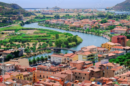View from above on the town Bosa and river Temo flowing into the
