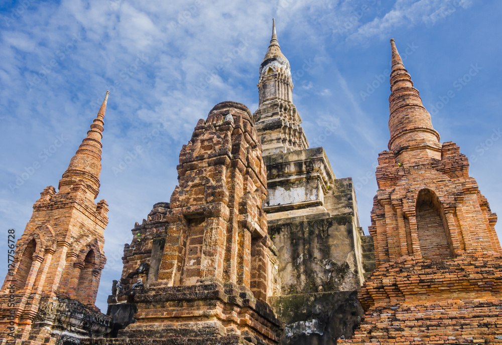 Perspective view of Stupa and Pagoda in Wat Mahathat Temple, Sukhothai Historical Park, Thailand
