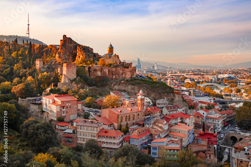 Beautiful sunset view of Old Tbilisi from the hill photo