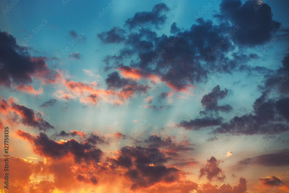 Sunset cloudscape. Beautiful sunrise with fluffy clouds. Sunset cloudscape. Beautiful sunrise with fluffy clouds.
