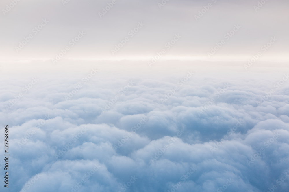Above the clouds. A view from an airplane.