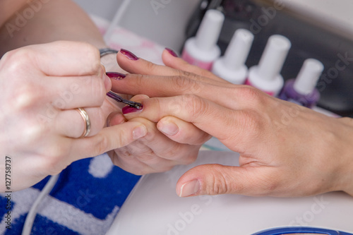 Manicure in beauty salon.  