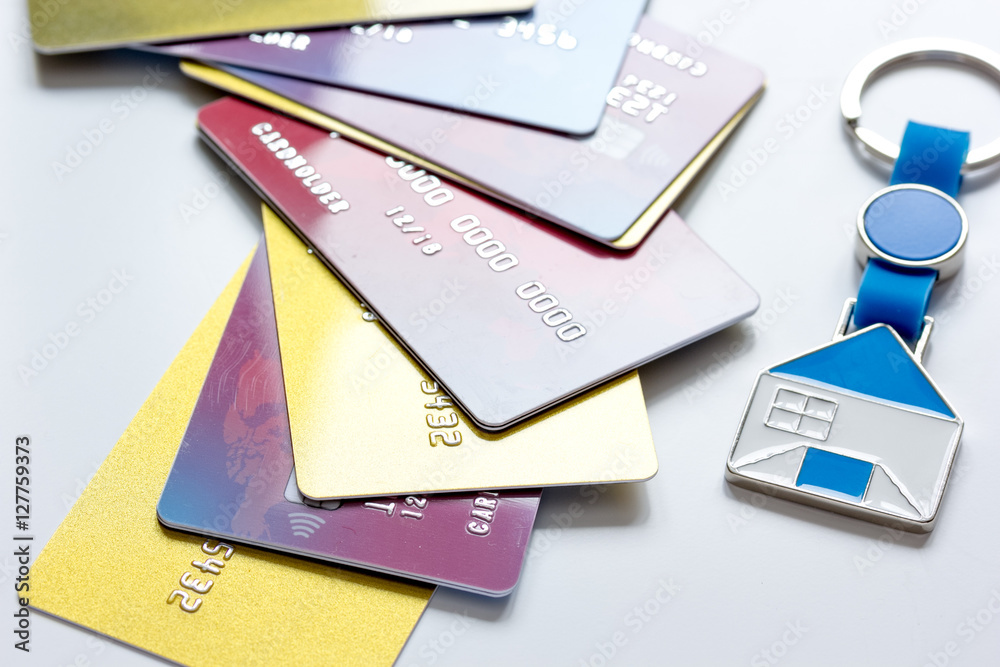 credit cards, key ring - concept mortgage on white background credit cards, key ring - concept mortgage on white background