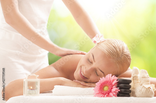 Portrait of young beautiful woman in a spa 