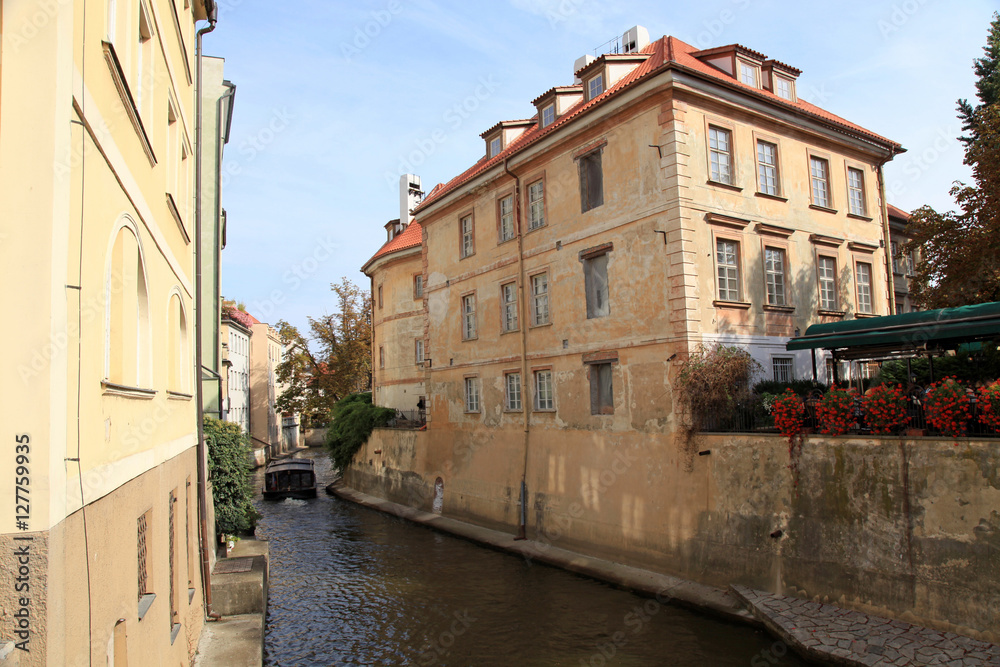 Old buildings and River Certovka in the district Mala strana, Prague