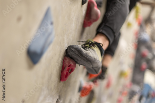 climbing shoes in boulder climbing hall photo