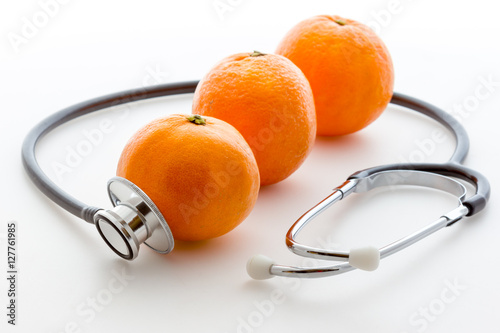 Stethoscope and orange