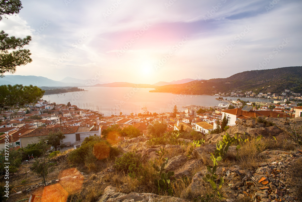 Panorama of the island of Poros at sunset, Greece.