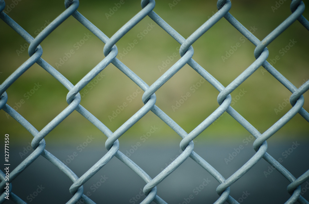 Closeup of diamond mesh fence Closeup of diamond mesh fence