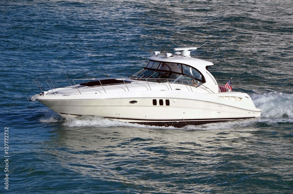 Up scale cabin cruiser on the florida intra-coastal waterway near Miami Beach,Florida