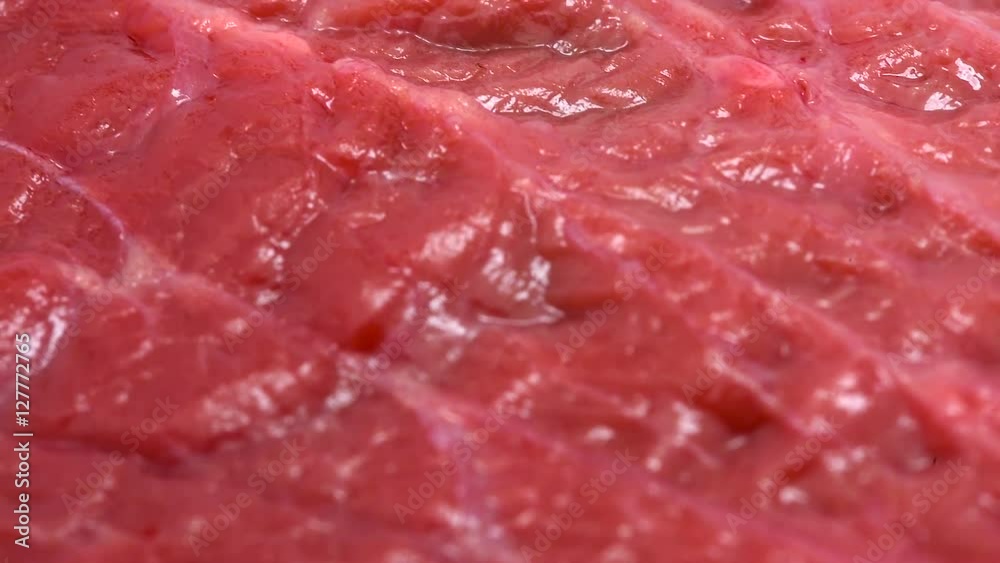 Rotating beef meat at white isolated background Rotating beef meat at white isolated background