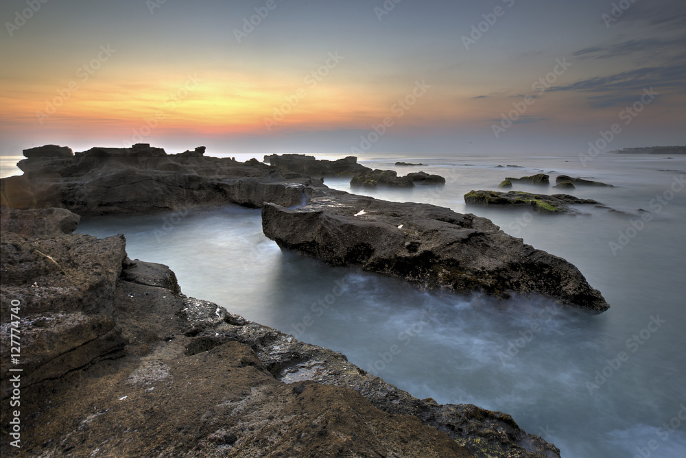 scenic view of beach during sunset