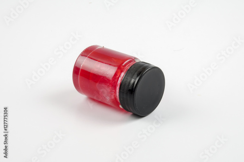 Red balm isolated on white