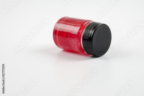 Red balm isolated on white