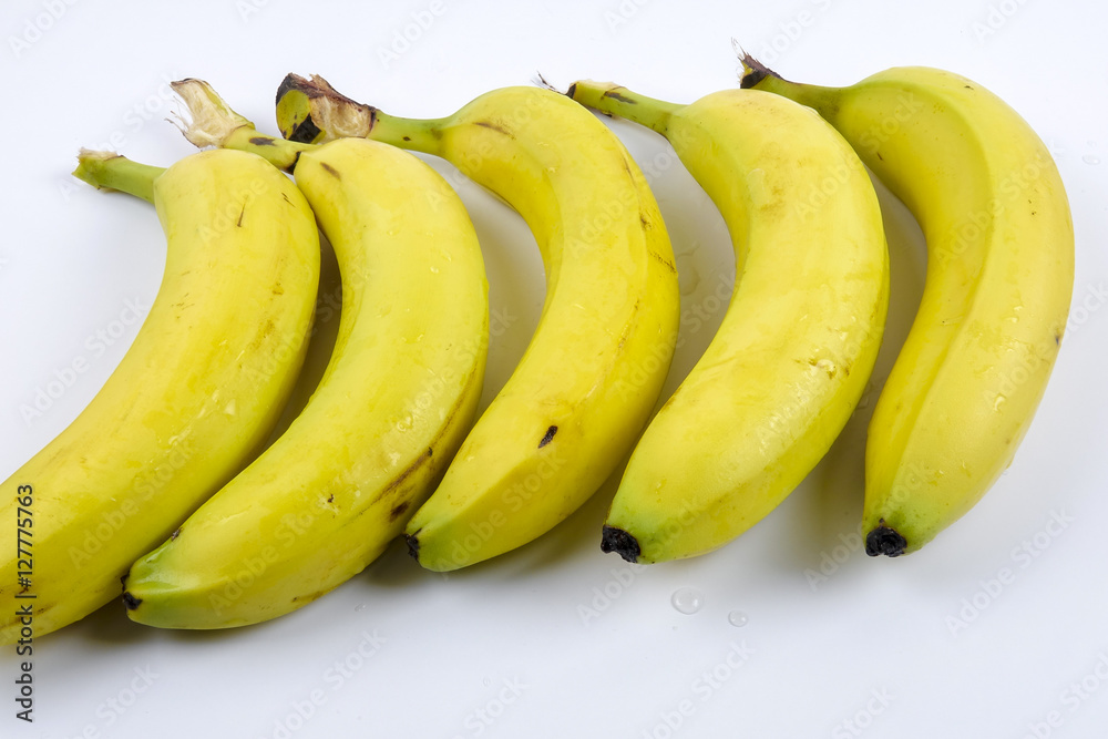 Ripe fresh bananas isolated on white background
