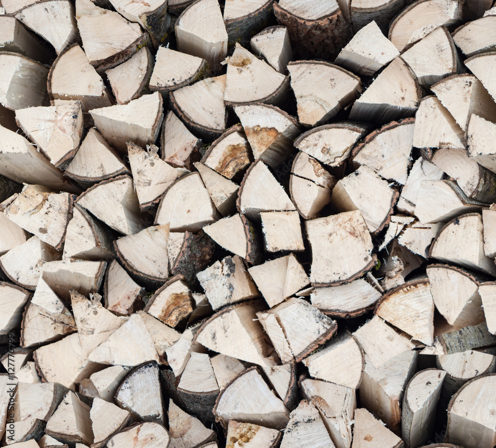 Fototapeta premium Seamless texture or background of firewood stack