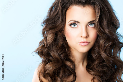 Beautiful girl with hairstyle and makeup.