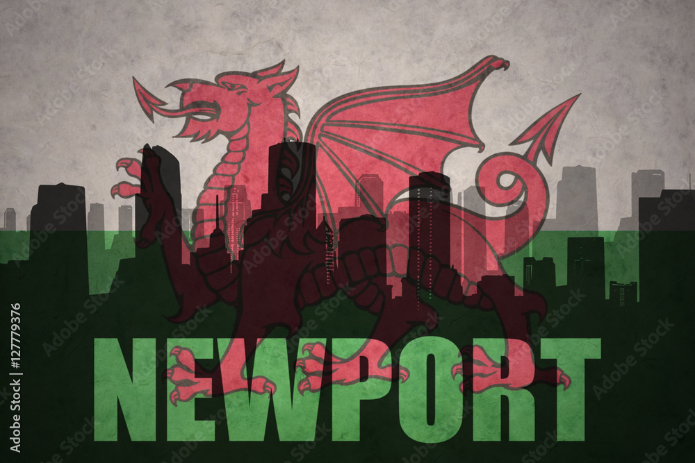 abstract silhouette of the city with text Newport at the vintage wales flag