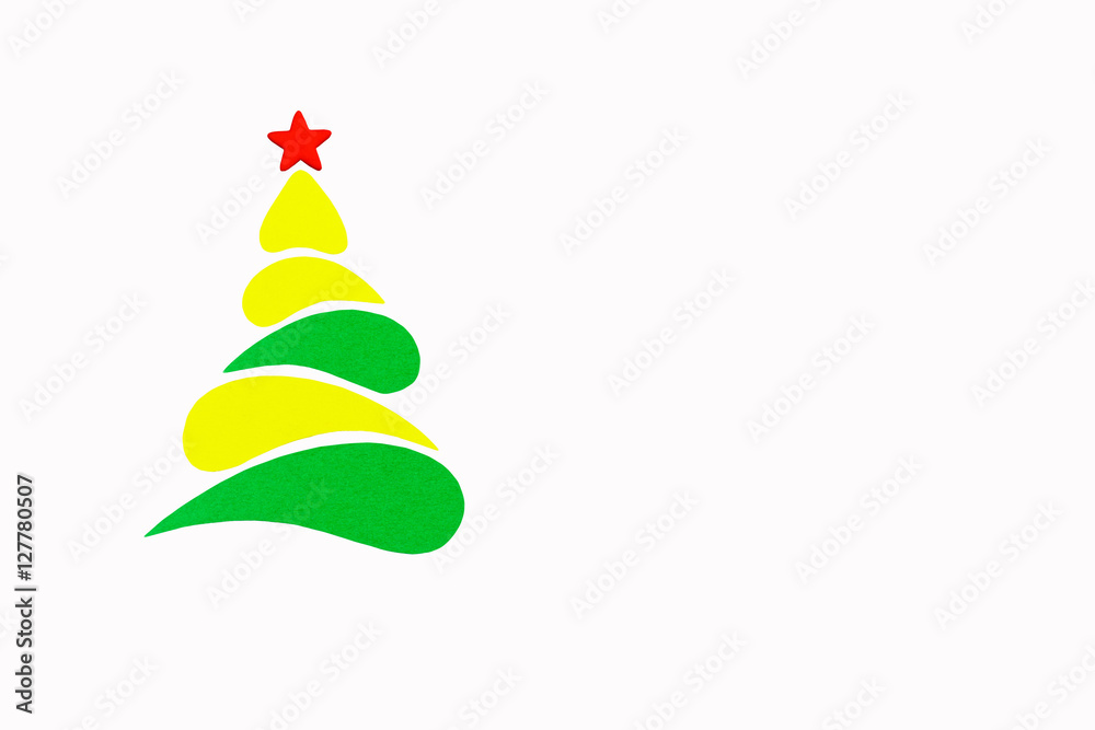 The New Year and Christmas conceptual tree made of a color cardboard. Isolated on a white background. The New Year and Christmas conceptual tree made of a color cardboard. Isolated on a white background.