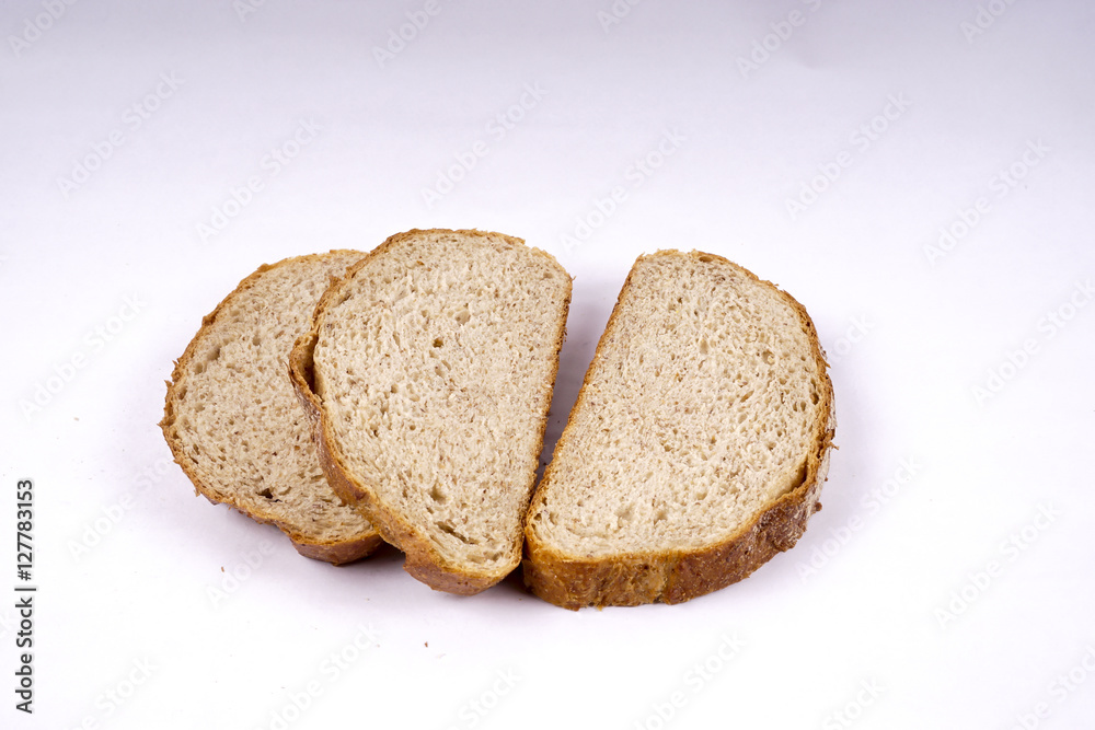 Whole grain bread isolated on white.