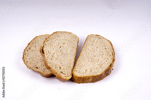 Whole grain bread isolated on white.
