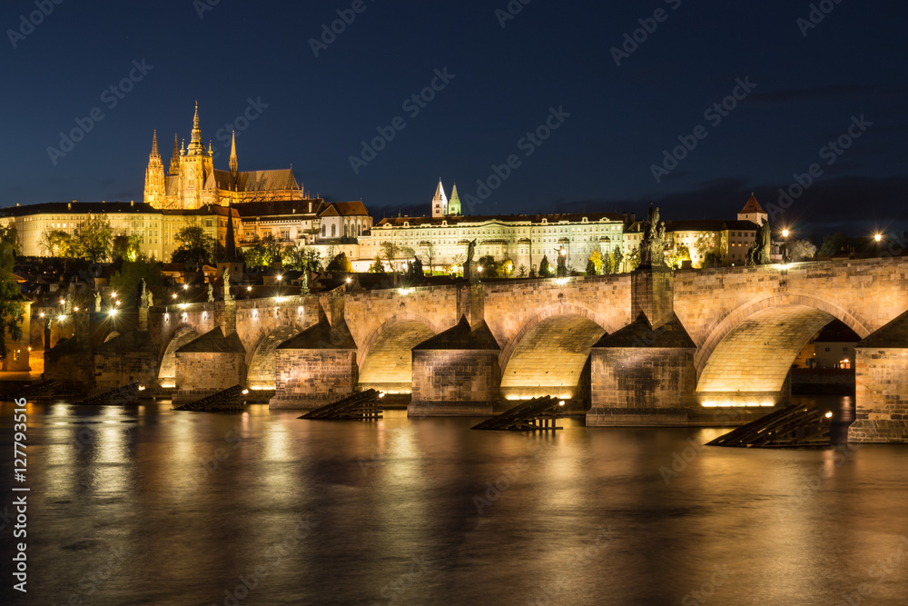 Prague Castle and Charles Bridge at night.
