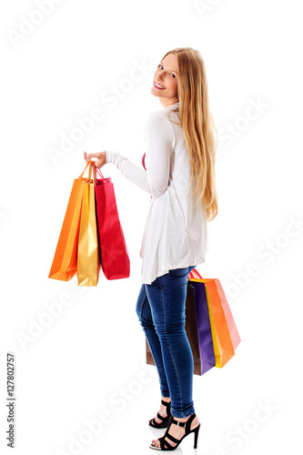 Beauty hhopping woman holding bags