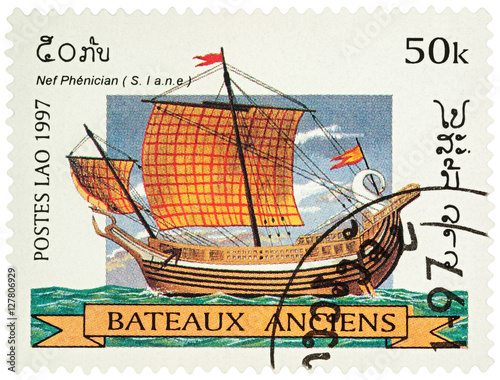 Ancient Phoenician ship on postage stamp photo