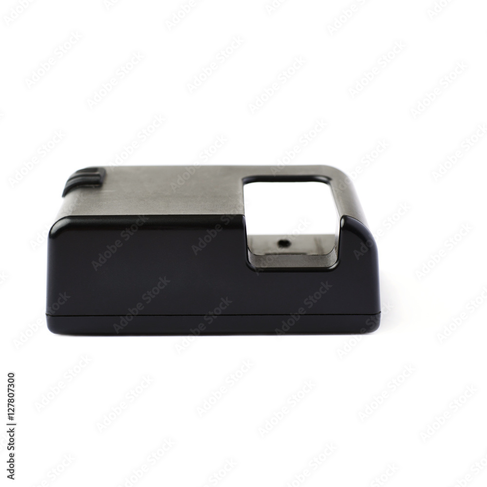 Battery charger isolated over white background Battery charger isolated over white background