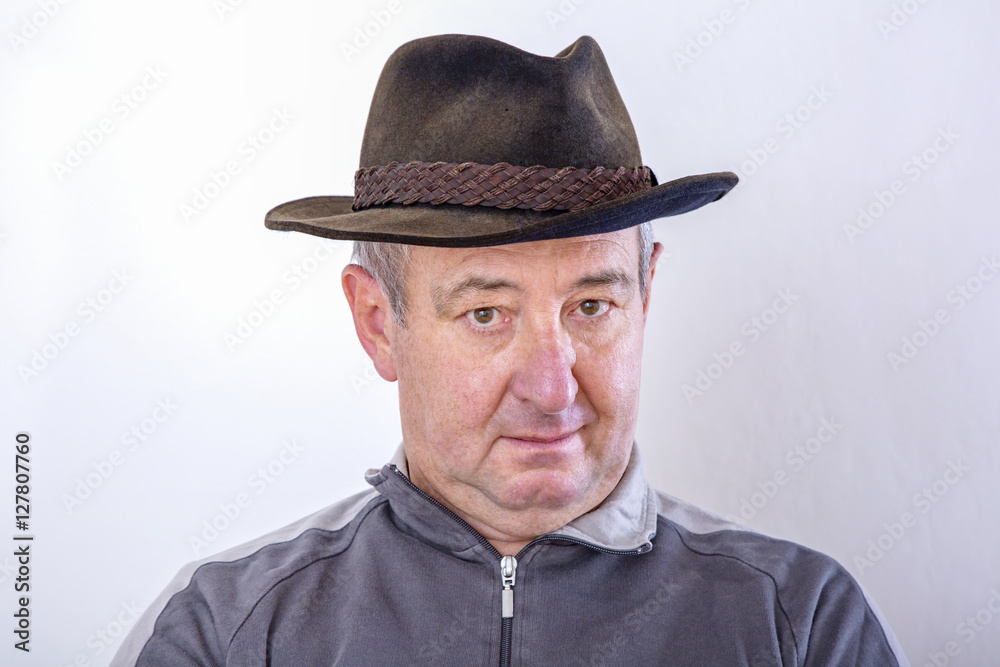 Man with hat as head cover