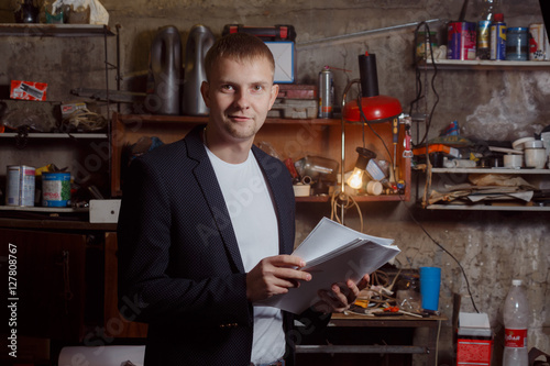 man in suit on an industrial premises, businessman